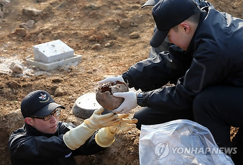 韓國開始發掘中國軍人遺骸 發掘工作需一周(圖)